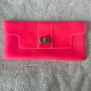 Sondra Robert’s bright Pink Jelly Clutch Bag